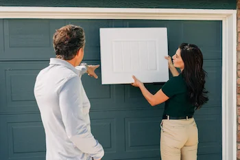 Customer buying a new garage door from Precision Garage Door