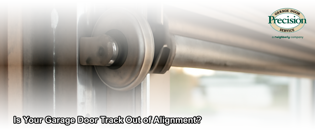Close-up of a garage door steel track showing visible gap between the roller and the rail, with a garage door partially open in a Chicago residential garage