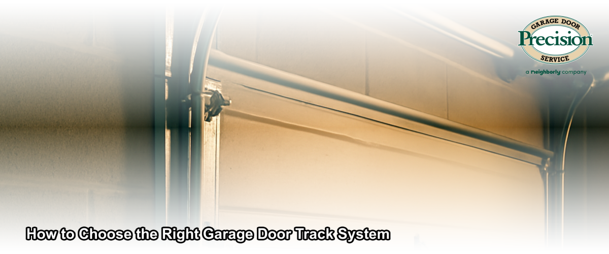 Close-up of a steel garage door track system installed in a Chicago residential garage, showing vertical and horizontal track sections with roller hardware