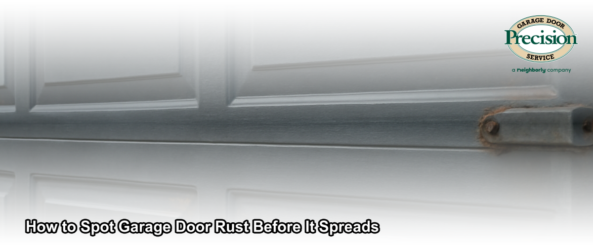 Close-up of rust and surface corrosion forming along the bottom panel of a residential garage door in Chicago