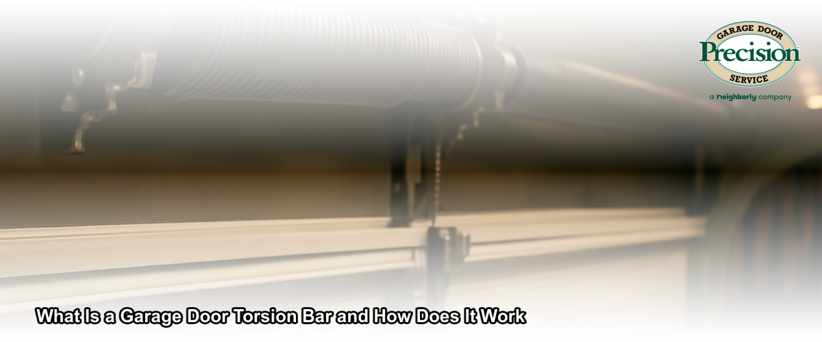 Close-up of a garage door torsion bar and spring assembly mounted above a residential garage door in Chicago